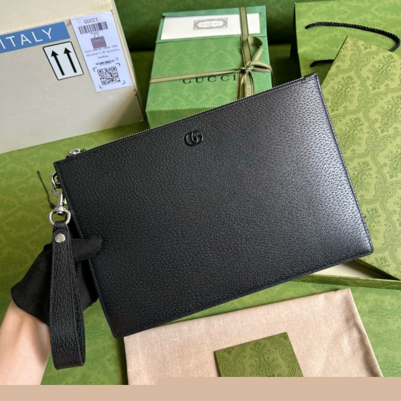 G*u*i clutch bags